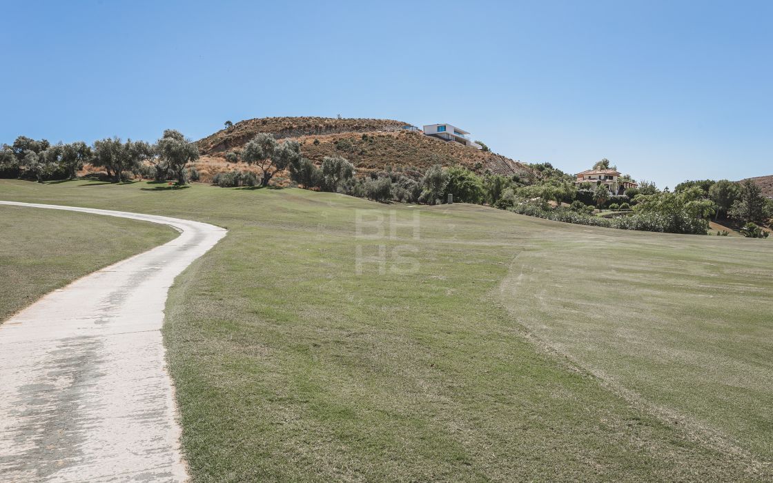 Impressive elegant Andalusian-style front line golf villa with panoramic golf and mountain views in Marbella Club Golf Resort