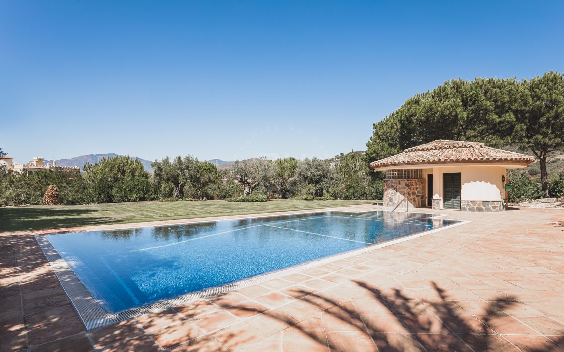 Impressive elegant Andalusian-style front line golf villa with panoramic golf and mountain views in Marbella Club Golf Resort