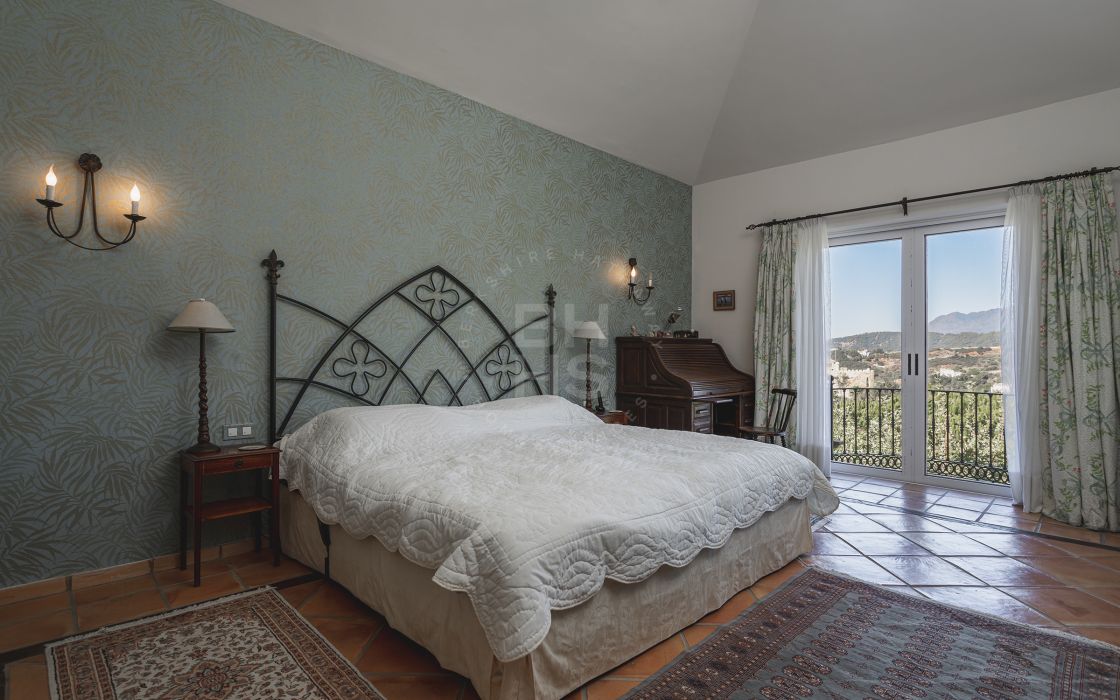 Impressive elegant Andalusian-style front line golf villa with panoramic golf and mountain views in Marbella Club Golf Resort