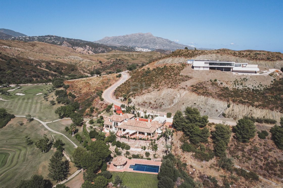 Impressive elegant Andalusian-style front line golf villa with panoramic golf and mountain views in Marbella Club Golf Resort