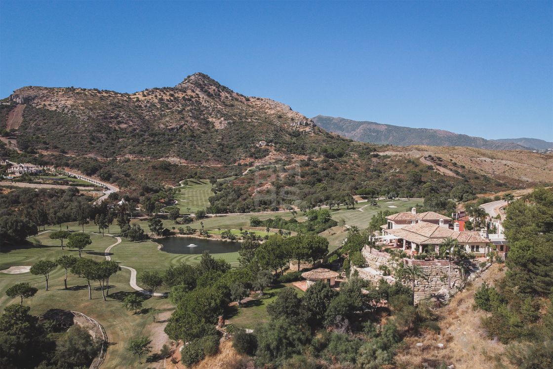 Impressive elegant Andalusian-style front line golf villa with panoramic golf and mountain views in Marbella Club Golf Resort