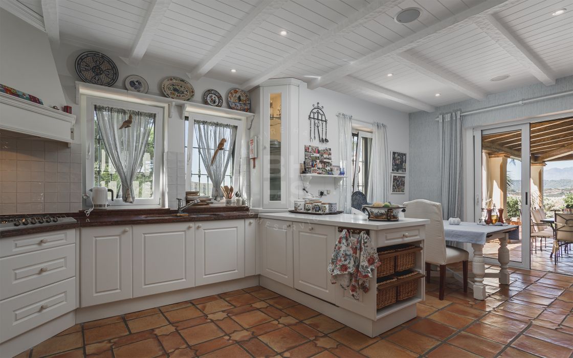 Impressive elegant Andalusian-style front line golf villa with panoramic golf and mountain views in Marbella Club Golf Resort