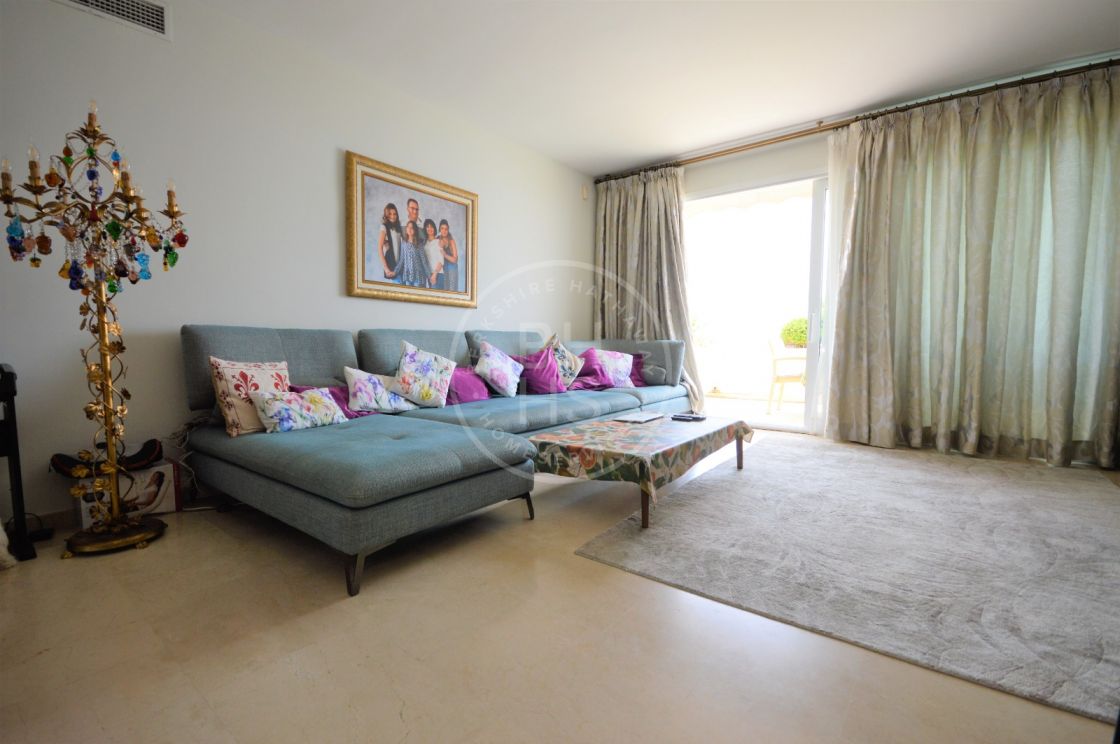 Bright duplex penthouse with private pool and open sea views in a beachfront location in Estepona
