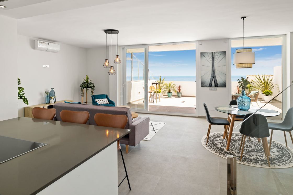 Contemporary front line beach duplex penthouse in Estepona West
