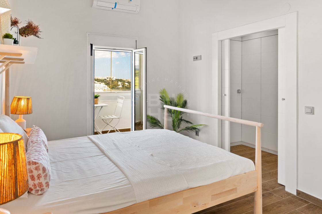 Contemporary front line beach duplex penthouse in Estepona West