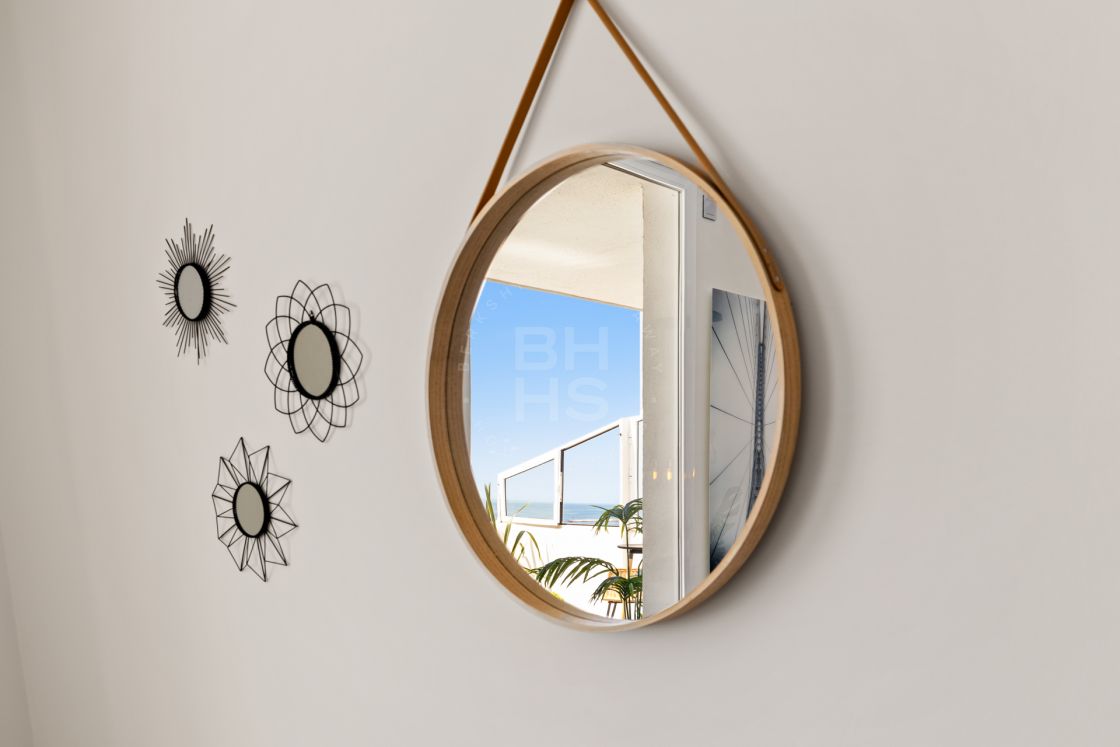 Contemporary front line beach duplex penthouse in Estepona West