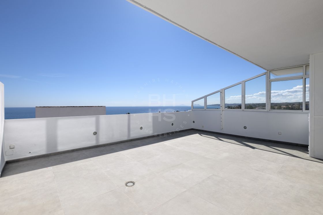 Contemporary front line beach duplex penthouse in Estepona West