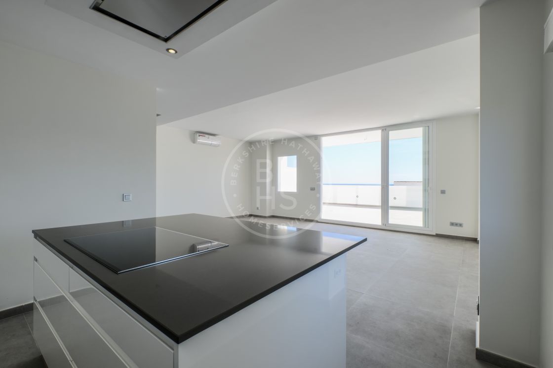 Contemporary front line beach duplex penthouse in Estepona West