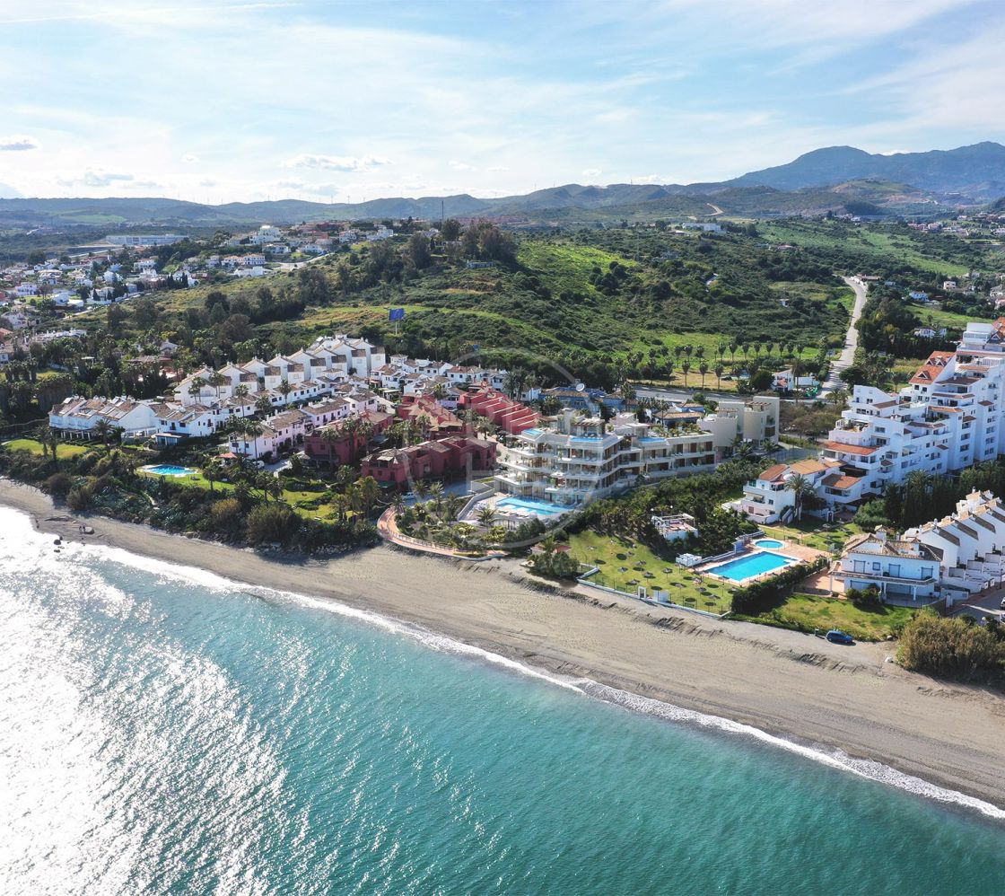 Completely renovated beachfront apartment with private garden in Estepona