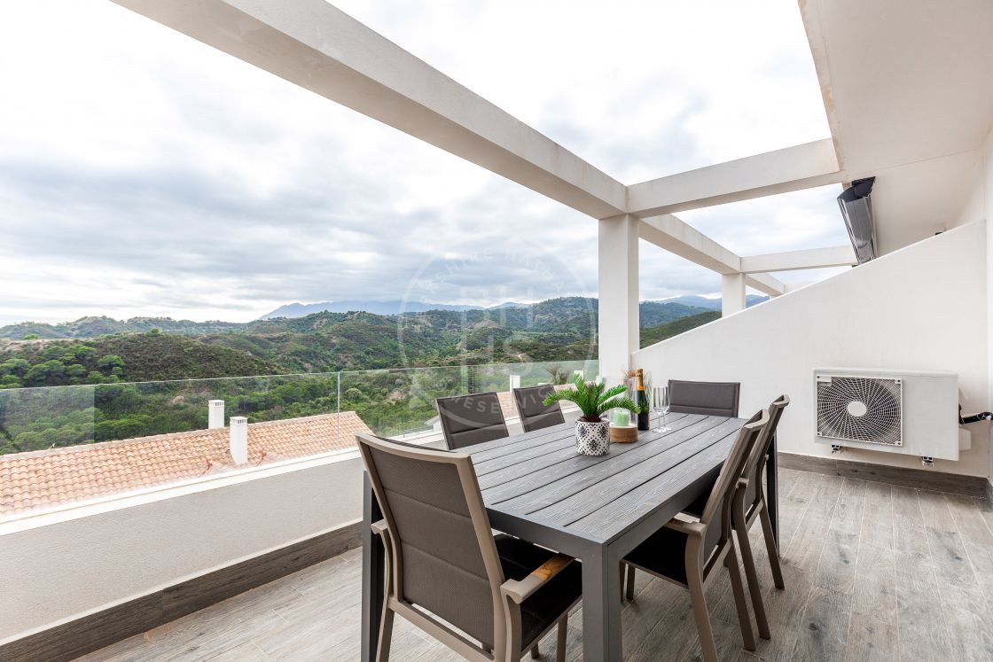 Brand new contemporary southwest-facing duplex penthouse with sea and mountain views in La Resina Golf, Estepona.