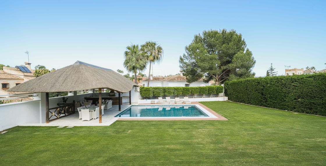 Impressive villa next to Centro Plaza and within walking distance to amenities, the beach, and Puerto Banús