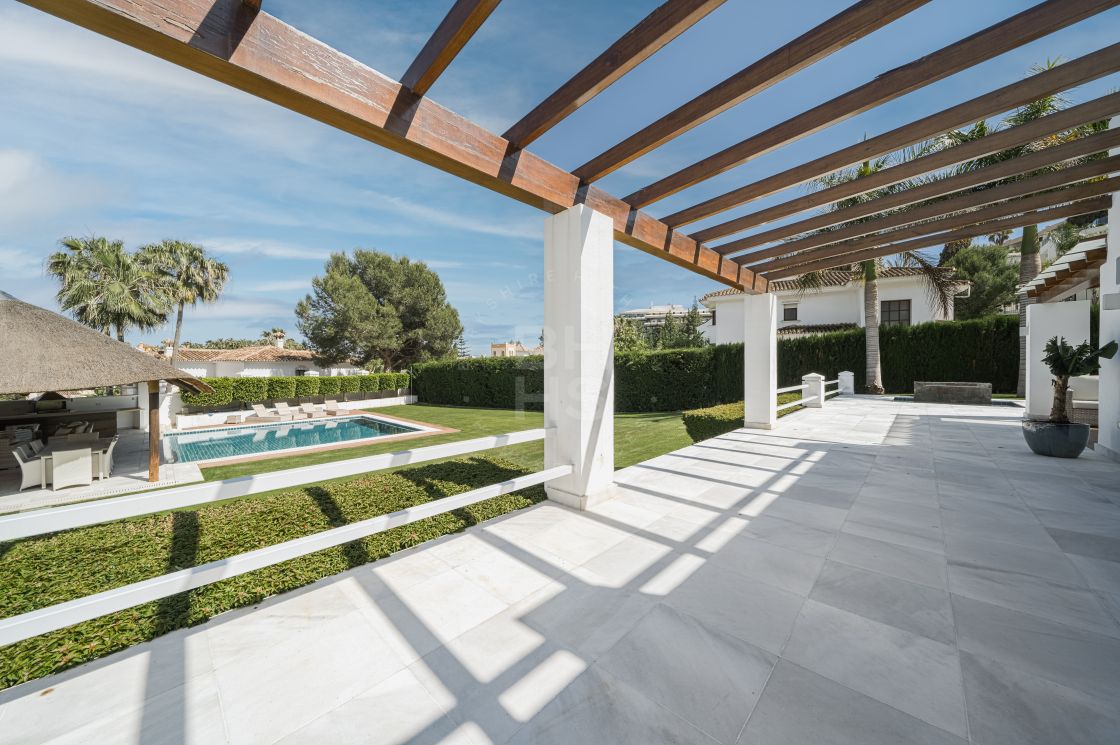 Impressive villa next to Centro Plaza and within walking distance to amenities, the beach, and Puerto Banús