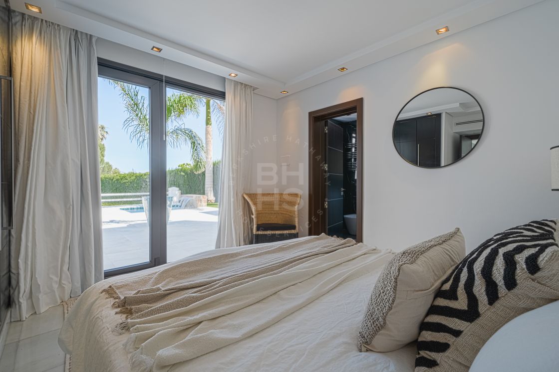 Impressive villa next to Centro Plaza and within walking distance to amenities, the beach, and Puerto Banús