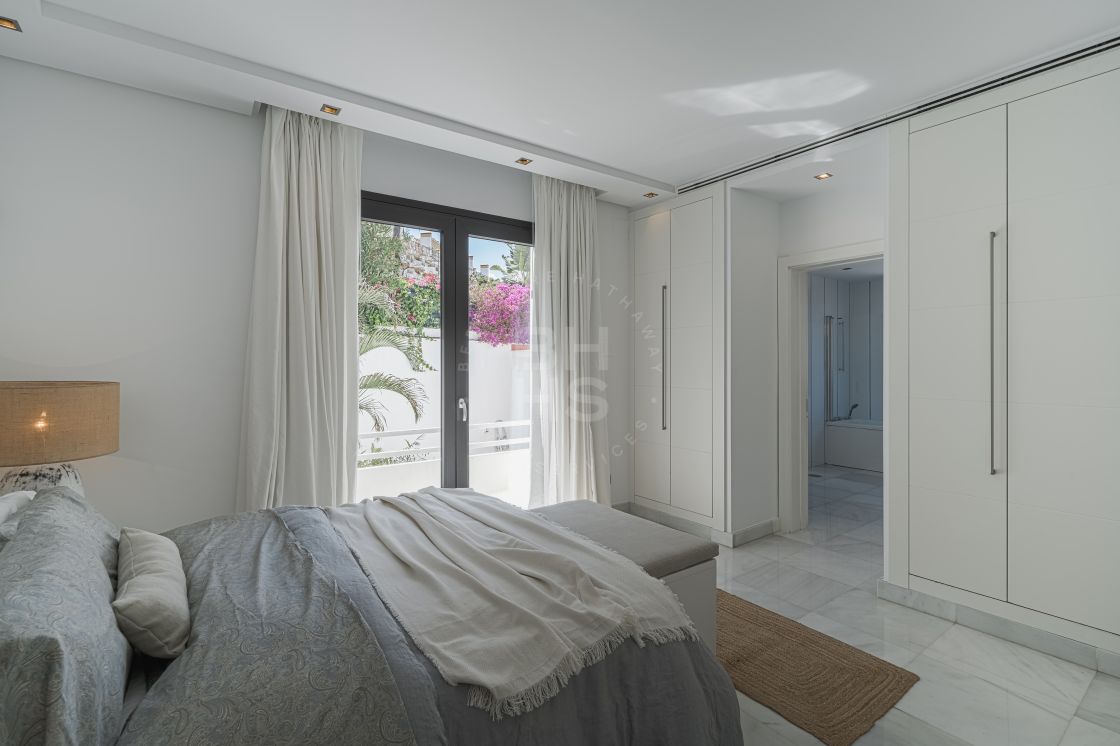 Impressive villa next to Centro Plaza and within walking distance to amenities, the beach, and Puerto Banús