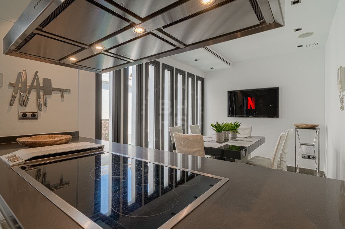 Impressive villa next to Centro Plaza and within walking distance to amenities, the beach, and Puerto Banús