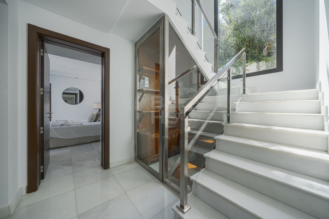 Impressive villa next to Centro Plaza and within walking distance to amenities, the beach, and Puerto Banús