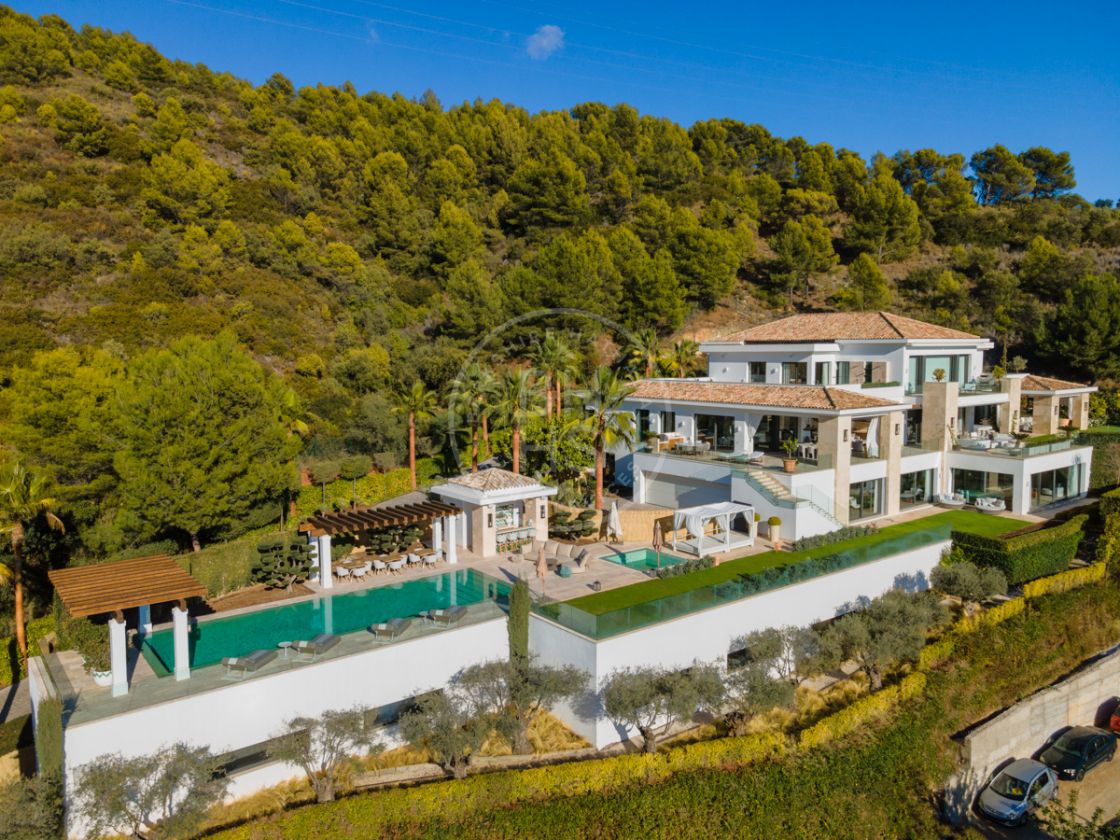 Exquisitely conceived estate with breathtaking and unencumbered panoramic views in Las Lomas del Marbella Club, on Marbella’s Golden Mile