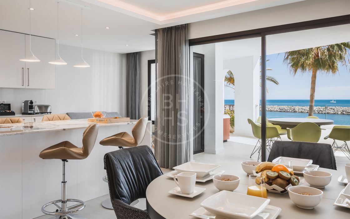 Contemporary beachfront apartment with panoramic sea views in Puerto Banús