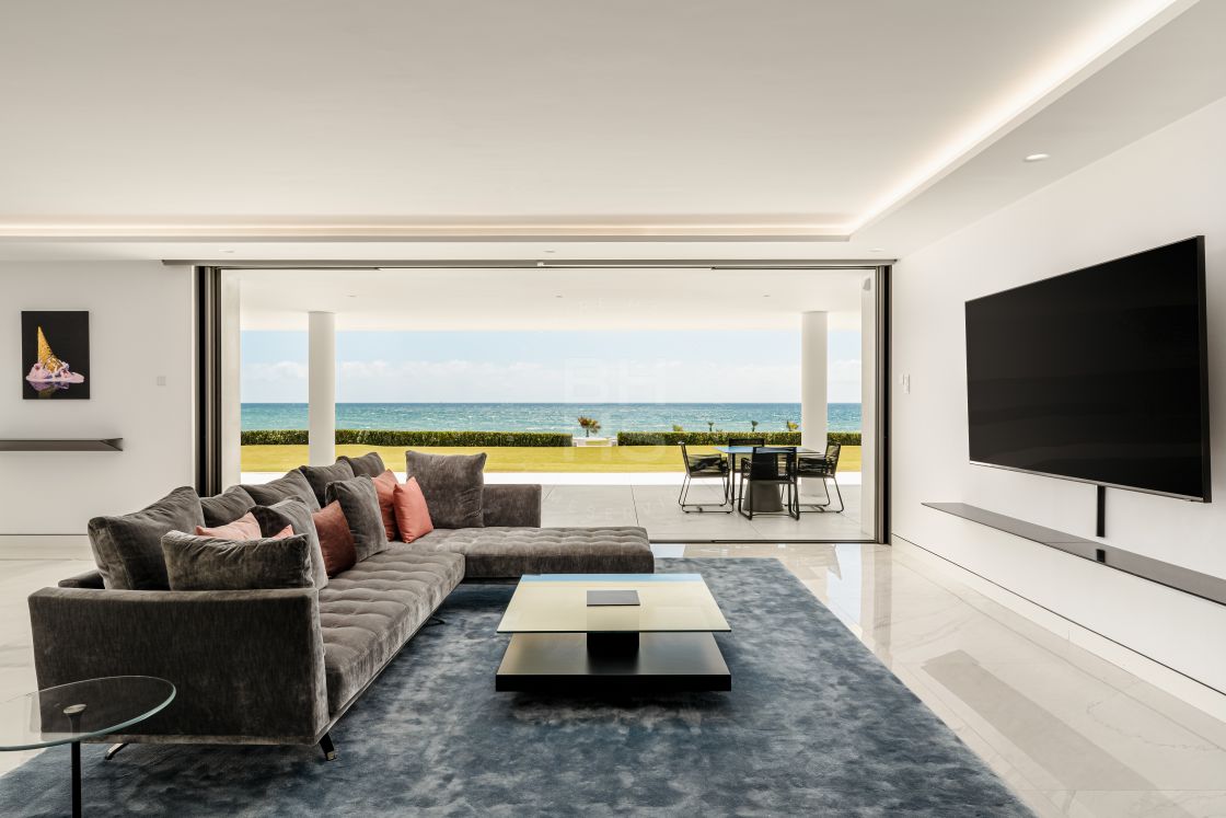 Impressive beachfront garden apartment on the New Golden Mile