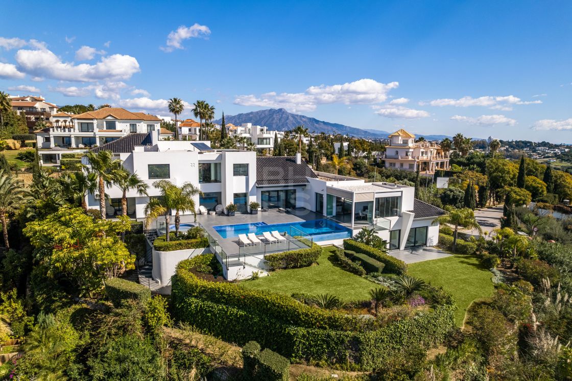 Impressive elegant Andalusian-style front line golf villa with panoramic golf and mountain views in Marbella Club Golf Resort