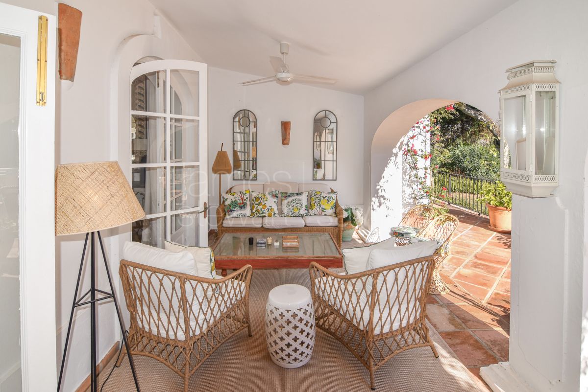 A charming and pretty Andalucian villa on a large frontline Royal Valderrama Golf Club plot