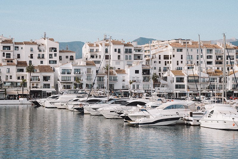 a group of boats in a harbor