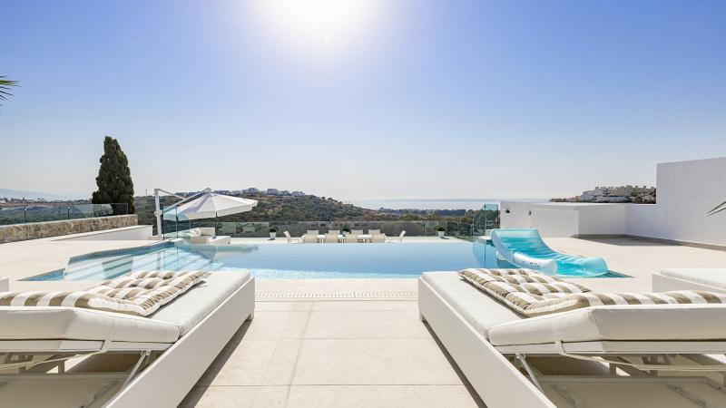 Modern Mediterranean Haven with Infinity Pool & Impressive Panoramic Views