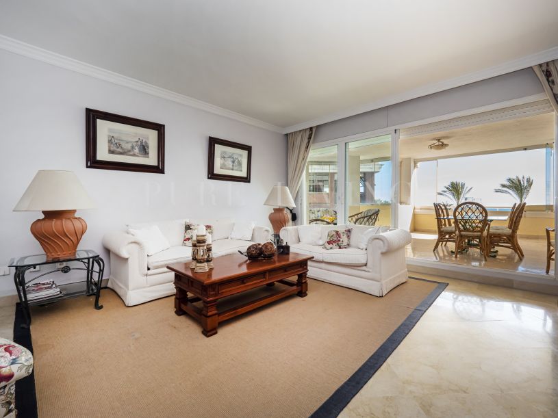 Spacious Front line beach Two bedroom Apartment with Stunning Sea views in La Herradura, Puerto Banus.