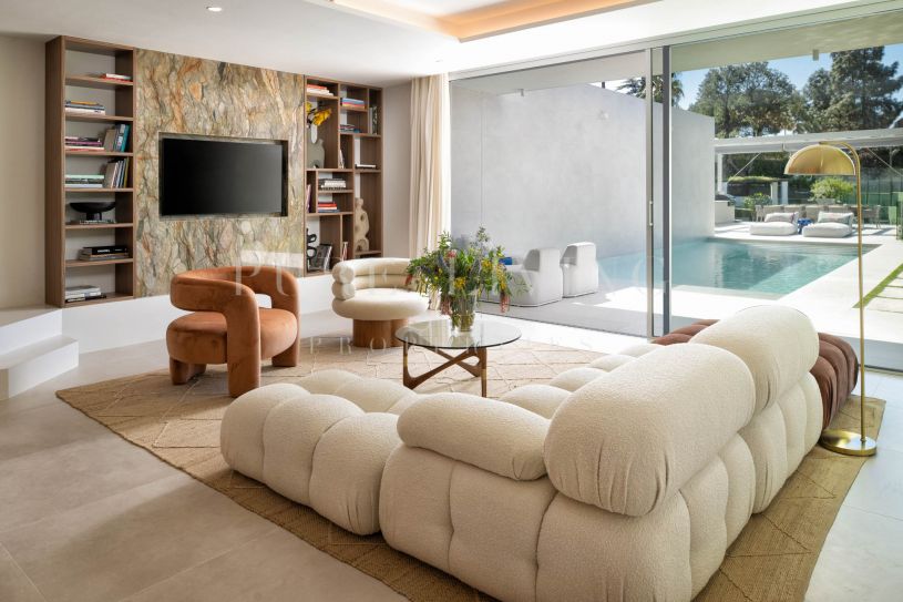 Luxury five-bedroom villa with private swimming pool, located within walking distance to the beach in the prime area of Elviria, Marbella East