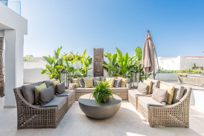 Scandinavian style design bungalow in the beachfront Oasis Club on Marbella's Golden Mile.