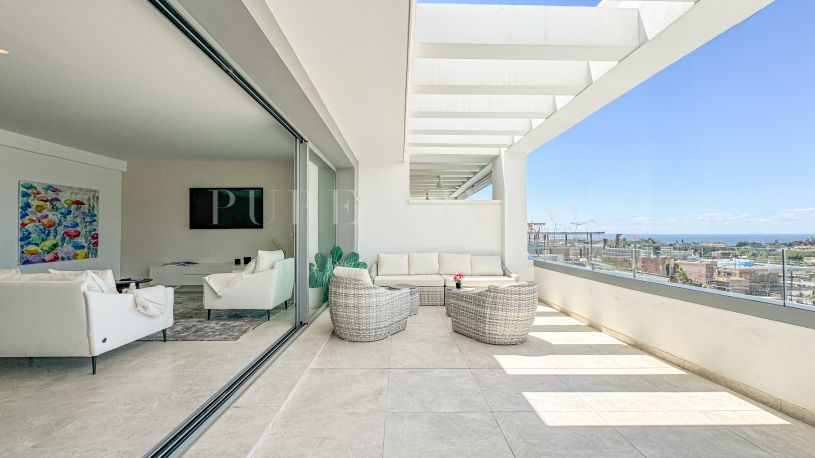 Contemporary penthouse with terrace and solarium both with panoramic views of the Mediterranean Sea in top location