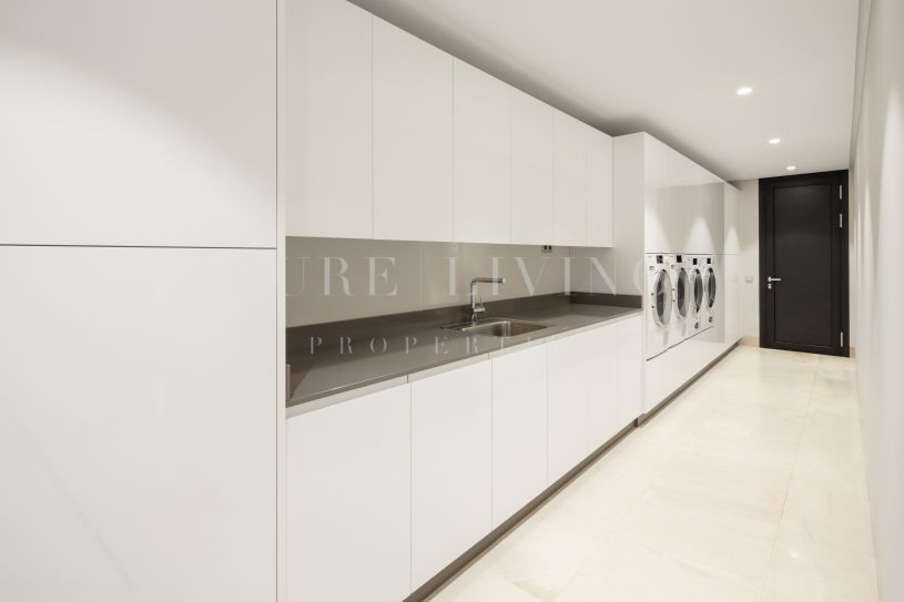 Contemporary Elegance with Panoramic Views of Sea, Golf and Mountains