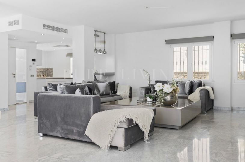 Opportunity in Elviria: 5-Bedroom Villa with Partial Sea Views, Walking Distance to Santa Maria Golf