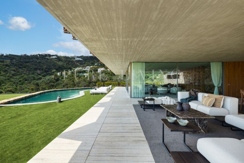 Ontworpen meesterwerk villa in La Madroñal met uitzicht op zee