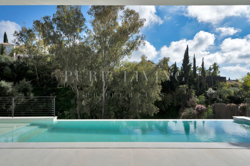 Stunning 4-bedroom villa with panoramic views in the Prestigious El Herrojo Alto, Benahavís