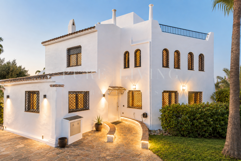 Refined golf-front townhouse with bright interiors & private solarium in prime Soleuropa, Nueva Andalucia