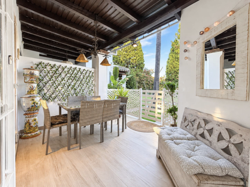 Refined golf-front townhouse with bright interiors & private solarium in prime Soleuropa, Nueva Andalucia