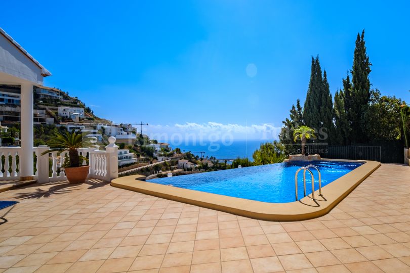 Spacious and bright villa with sea views located in La Corona de Jávea, Alicante.