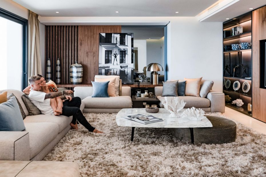 A couple in the living room of the villa in Sierra Blanca, Marbella