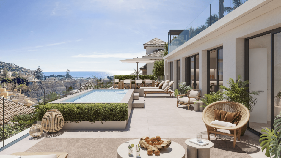 A beautiful terrace in a property in Malaga city, we can see the sea on the horizon, food on a little table and a swimming pool