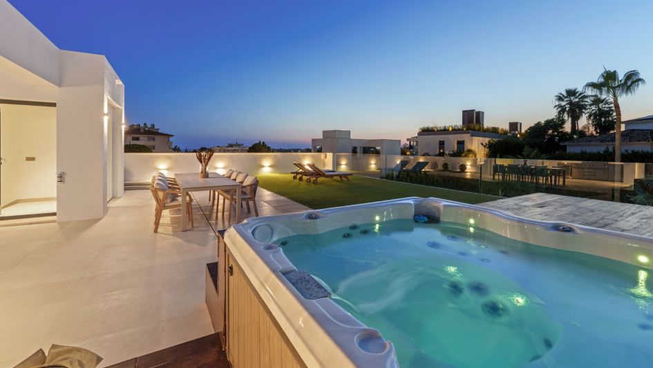 Rooftop views and spa jacuzzi of a luxury villa in Marbella