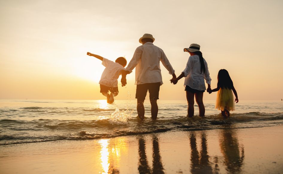 Family on the beach in Marbella