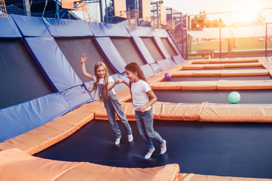 Girls jumping in trampoline park