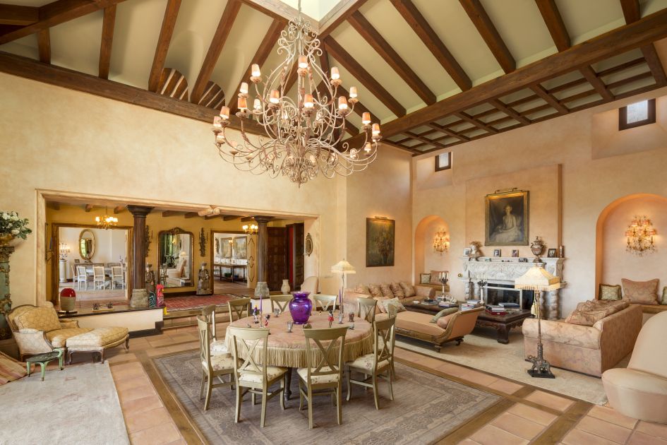 Salon, a cosy family room with bar, a formal dining room, private office and a card table