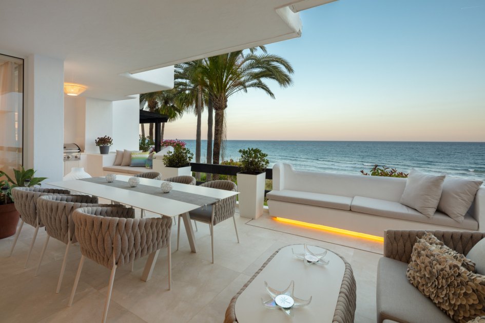 Luxury beachfront terrace with panoramic sea views located in puente romano