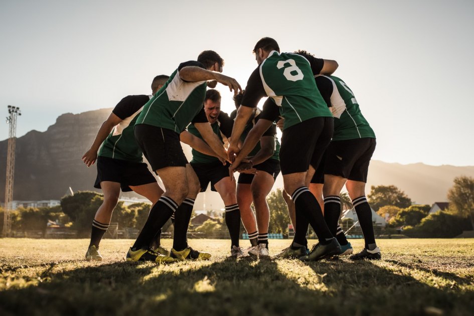 Photographie de personnes jouant au rugby
