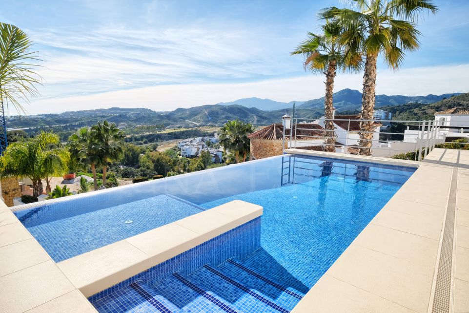 Contemporary design villa with sea views in Puerto Capitan, Benahavis.