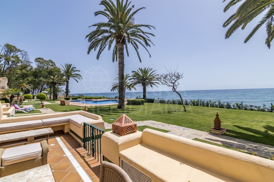 Ideally located beachfront townhouse with stunning views for sale in Lun y May, New Golden Mile, Estepona