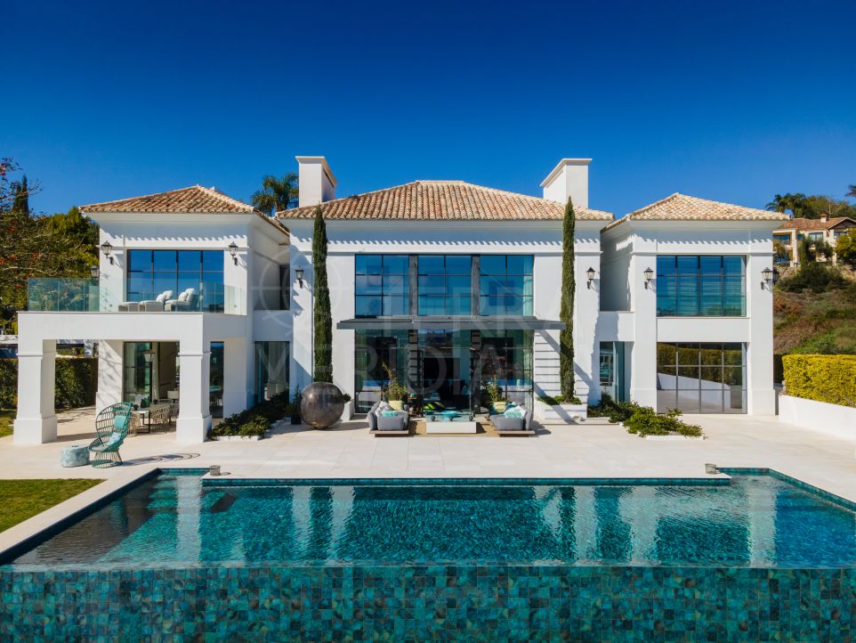 Front line golf villa with designer details and luxury amenities for sale in Los Flamingos, Benahavis