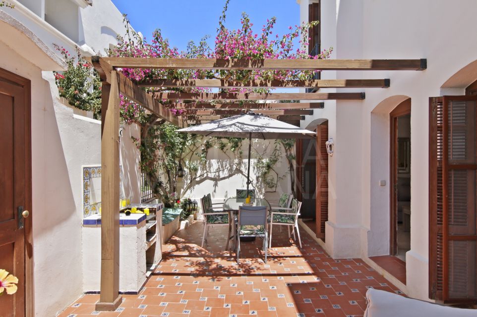 Encantadora casa adosada en venta en la comunidad costera de Villacana